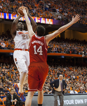 Rakeem Christmas elevates to shoot over N.C. Statecenter Jordan Vandenberg on Saturday night. Christmas wentfor 14 points and 12 reboundsin SU's win.