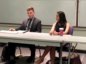 Aysha Seedat and Phil Kramer, candidates for SA President and Comptroller, respectively, answer questions from the lone student who attended the official Student Association candidate forum Sunday night in Shaffer Auditorium