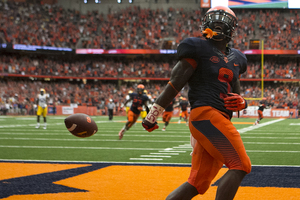 Estime celebrates his 40-yard, third-quarter touchdown catch. The score brought the Orange within seven points of LSU.