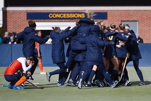 Syracuse's season came to an abrupt end in overtime as the Orange couldn't overcome a missing player due to a red card.