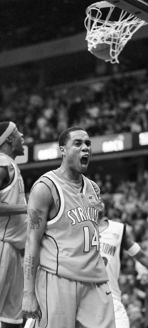 Billy Edelin reacts after his overtime steal helped the Orangemen put away the Hoyas, 93-84, on Saturday at the MCI Center. The freshman point guard scored 14 points in 38 minutes, a season high.