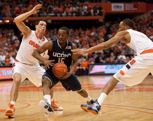 Kemba Walker (middle) is having the best statistical season of his career and has led Connecticut to a No. 6 ranking so far this year.