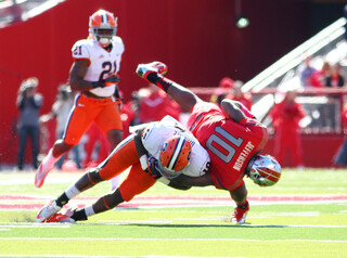 Syracuse linebacker Siriki Diabate lays a hard hit on Rutgers tight end D.C. Jefferson.