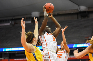 Maeva Djaldi-Tabdi goes up for a layup with contact.